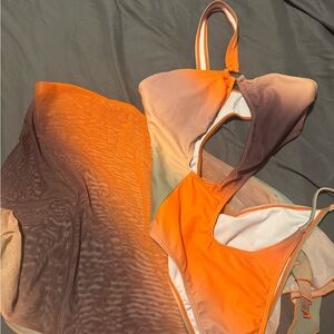 One piece with coverup skirt to match